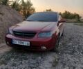 Красный Шевроле Лачетти, объемом двигателя 1.8 л и пробегом 211 тыс. км за 5200 $, фото 9 на Automoto.ua