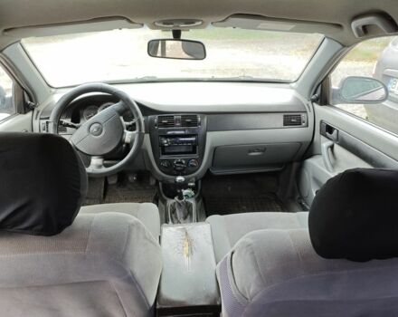 Красный Шевроле Лачетти, объемом двигателя 1.6 л и пробегом 231 тыс. км за 3400 $, фото 6 на Automoto.ua