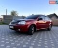 Красный Шевроле Лачетти, объемом двигателя 1.6 л и пробегом 202 тыс. км за 5300 $, фото 1 на Automoto.ua