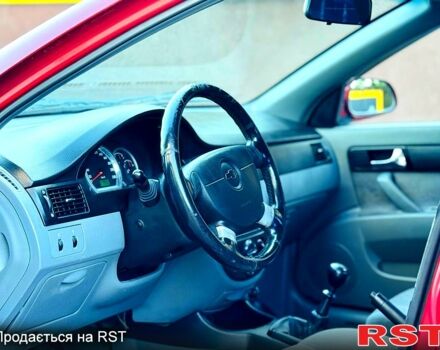 Красный Шевроле Лачетти, объемом двигателя 1.8 л и пробегом 195 тыс. км за 4300 $, фото 2 на Automoto.ua