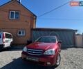 Красный Шевроле Лачетти, объемом двигателя 1.8 л и пробегом 230 тыс. км за 4100 $, фото 1 на Automoto.ua