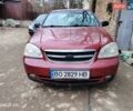 Красный Шевроле Лачетти, объемом двигателя 1.6 л и пробегом 350 тыс. км за 1800 $, фото 1 на Automoto.ua