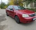 Красный Шевроле Лачетти, объемом двигателя 1.6 л и пробегом 231 тыс. км за 3400 $, фото 2 на Automoto.ua