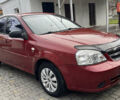 Красный Шевроле Лачетти, объемом двигателя 1.6 л и пробегом 200 тыс. км за 3650 $, фото 1 на Automoto.ua