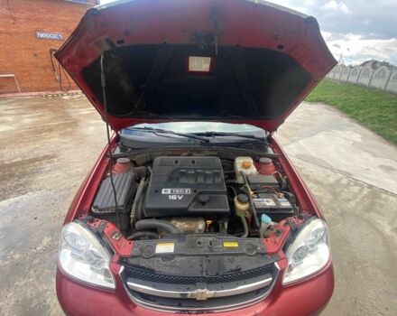 Красный Шевроле Лачетти, объемом двигателя 1.6 л и пробегом 220 тыс. км за 3600 $, фото 4 на Automoto.ua
