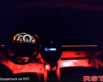 Красный Шевроле Лачетти, объемом двигателя 1.8 л и пробегом 218 тыс. км за 4700 $, фото 5 на Automoto.ua