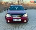 Красный Шевроле Лачетти, объемом двигателя 1.6 л и пробегом 225 тыс. км за 2999 $, фото 1 на Automoto.ua