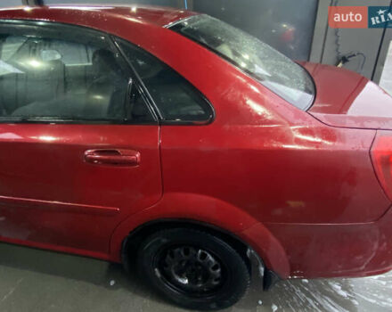 Красный Шевроле Лачетти, объемом двигателя 1.6 л и пробегом 225 тыс. км за 2900 $, фото 2 на Automoto.ua