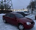 Красный Шевроле Лачетти, объемом двигателя 1.8 л и пробегом 294 тыс. км за 4250 $, фото 1 на Automoto.ua