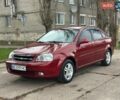 Красный Шевроле Лачетти, объемом двигателя 1.8 л и пробегом 260 тыс. км за 4400 $, фото 1 на Automoto.ua