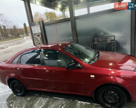 Красный Шевроле Лачетти, объемом двигателя 1.6 л и пробегом 225 тыс. км за 2900 $, фото 4 на Automoto.ua