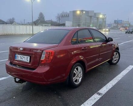 Красный Шевроле Лачетти, объемом двигателя 1.8 л и пробегом 155 тыс. км за 5300 $, фото 4 на Automoto.ua