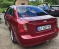 Червоний Шевроле Лачетті, об'ємом двигуна 1.8 л та пробігом 302 тис. км за 3400 $, фото 1 на Automoto.ua