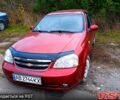 Красный Шевроле Лачетти, объемом двигателя 1.8 л и пробегом 312 тыс. км за 400 $, фото 1 на Automoto.ua