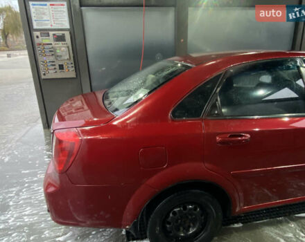 Красный Шевроле Лачетти, объемом двигателя 1.6 л и пробегом 225 тыс. км за 2900 $, фото 5 на Automoto.ua