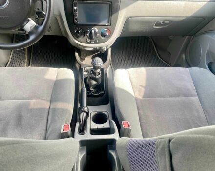 Красный Шевроле Лачетти, объемом двигателя 1.6 л и пробегом 220 тыс. км за 3600 $, фото 5 на Automoto.ua