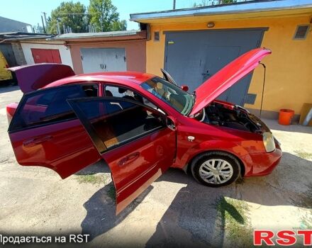 Красный Шевроле Лачетти, объемом двигателя 1.8 л и пробегом 186 тыс. км за 3000 $, фото 3 на Automoto.ua