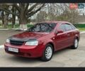 Червоний Шевроле Лачетті, об'ємом двигуна 1.6 л та пробігом 245 тис. км за 3799 $, фото 1 на Automoto.ua