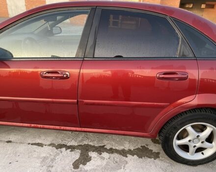 Красный Шевроле Лачетти, объемом двигателя 1.6 л и пробегом 220 тыс. км за 3600 $, фото 14 на Automoto.ua