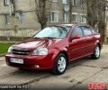 Красный Шевроле Лачетти, объемом двигателя 1.8 л и пробегом 260 тыс. км за 4400 $, фото 1 на Automoto.ua