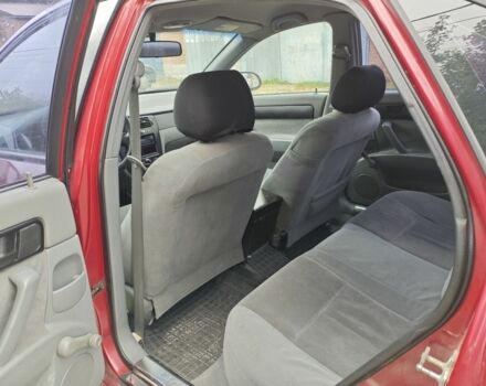 Красный Шевроле Лачетти, объемом двигателя 1.6 л и пробегом 231 тыс. км за 3400 $, фото 7 на Automoto.ua