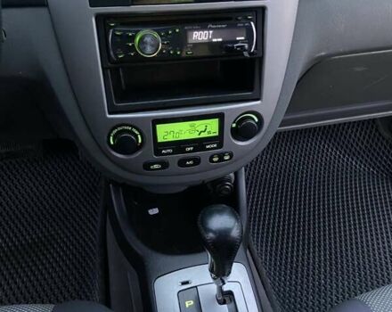 Красный Шевроле Лачетти, объемом двигателя 1.8 л и пробегом 155 тыс. км за 5300 $, фото 13 на Automoto.ua