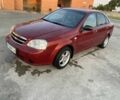 Красный Шевроле Лачетти, объемом двигателя 1.6 л и пробегом 220 тыс. км за 3600 $, фото 1 на Automoto.ua