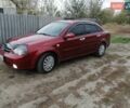 Красный Шевроле Лачетти, объемом двигателя 1.8 л и пробегом 213 тыс. км за 5000 $, фото 1 на Automoto.ua