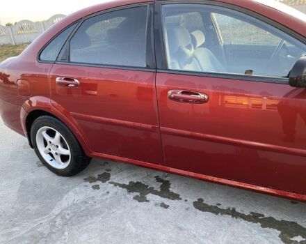 Красный Шевроле Лачетти, объемом двигателя 1.6 л и пробегом 220 тыс. км за 3600 $, фото 13 на Automoto.ua