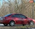 Красный Шевроле Лачетти, объемом двигателя 1.6 л и пробегом 219 тыс. км за 3000 $, фото 2 на Automoto.ua
