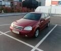 Красный Шевроле Лачетти, объемом двигателя 1.8 л и пробегом 231 тыс. км за 5000 $, фото 1 на Automoto.ua
