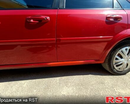 Красный Шевроле Лачетти, объемом двигателя 1.8 л и пробегом 186 тыс. км за 3000 $, фото 6 на Automoto.ua