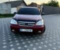 Червоний Шевроле Лачетті, об'ємом двигуна 1.6 л та пробігом 202 тис. км за 5500 $, фото 1 на Automoto.ua
