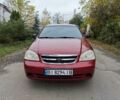 Красный Шевроле Лачетти, объемом двигателя 1.6 л и пробегом 231 тыс. км за 3400 $, фото 1 на Automoto.ua