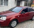 Красный Шевроле Лачетти, объемом двигателя 1.6 л и пробегом 200 тыс. км за 3650 $, фото 1 на Automoto.ua
