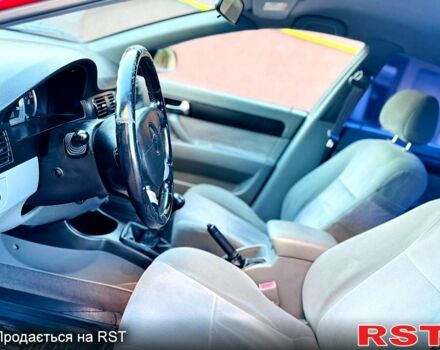 Красный Шевроле Лачетти, объемом двигателя 1.8 л и пробегом 195 тыс. км за 4300 $, фото 1 на Automoto.ua