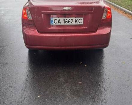 Красный Шевроле Лачетти, объемом двигателя 1.6 л и пробегом 275 тыс. км за 4500 $, фото 2 на Automoto.ua