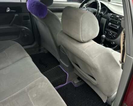 Красный Шевроле Лачетти, объемом двигателя 1.8 л и пробегом 195 тыс. км за 3700 $, фото 3 на Automoto.ua