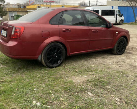 Красный Шевроле Лачетти, объемом двигателя 1.8 л и пробегом 267 тыс. км за 3500 $, фото 1 на Automoto.ua