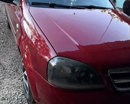 Красный Шевроле Лачетти, объемом двигателя 1.6 л и пробегом 368 тыс. км за 3300 $, фото 5 на Automoto.ua