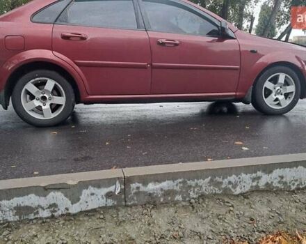Красный Шевроле Лачетти, объемом двигателя 1.6 л и пробегом 275 тыс. км за 4500 $, фото 8 на Automoto.ua