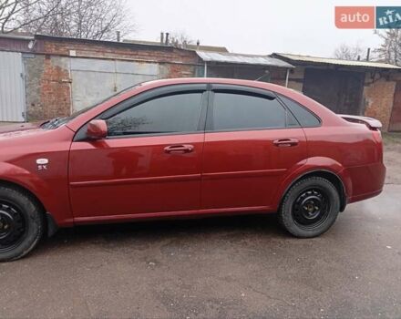 Красный Шевроле Лачетти, объемом двигателя 1.8 л и пробегом 290 тыс. км за 4100 $, фото 4 на Automoto.ua