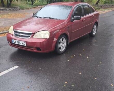 Красный Шевроле Лачетти, объемом двигателя 1.6 л и пробегом 275 тыс. км за 4500 $, фото 7 на Automoto.ua