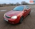 Красный Шевроле Лачетти, объемом двигателя 1.8 л и пробегом 248 тыс. км за 3500 $, фото 1 на Automoto.ua