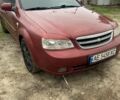 Красный Шевроле Лачетти, объемом двигателя 1.8 л и пробегом 267 тыс. км за 3999 $, фото 3 на Automoto.ua