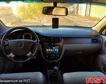 Червоний Шевроле Лачетті, об'ємом двигуна 1.8 л та пробігом 189 тис. км за 3800 $, фото 4 на Automoto.ua