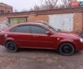 Красный Шевроле Лачетти, объемом двигателя 1.8 л и пробегом 290 тыс. км за 4100 $, фото 1 на Automoto.ua