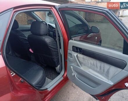 Красный Шевроле Лачетти, объемом двигателя 1.8 л и пробегом 290 тыс. км за 4100 $, фото 15 на Automoto.ua