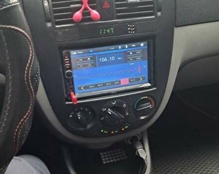 Красный Шевроле Лачетти, объемом двигателя 1.6 л и пробегом 275 тыс. км за 4500 $, фото 12 на Automoto.ua