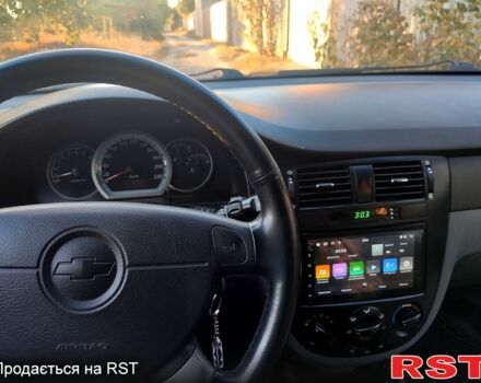 Червоний Шевроле Лачетті, об'ємом двигуна 1.8 л та пробігом 189 тис. км за 3800 $, фото 5 на Automoto.ua